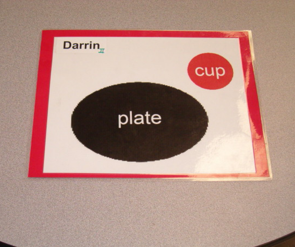 This image shows a placemat visual that directs the student where to place the cup and plate.